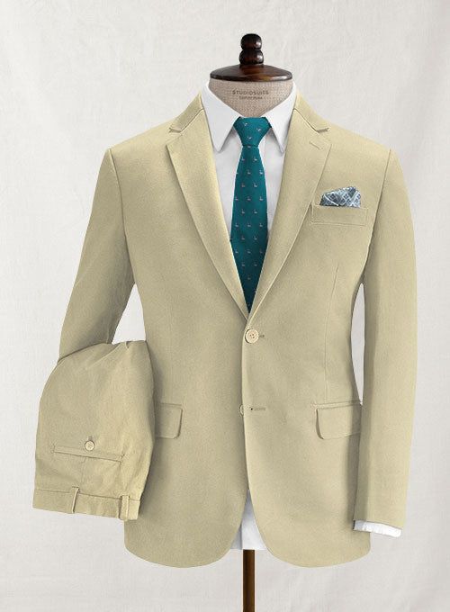 Truly unique and fascinating, make your tailored collection a bit more special by adding this Stretch Summer Weight Khaki Chino suit. Crafted from cotton lycra blend, this suit offers natural stretch for effortless motion. Combine it with a matching waistcoat, a crisp white shirt, brown patterned tie and brown shoes. L Beige Cotton Blazer With Suit Collar, Beige Cotton Notch Lapel Blazer, Beige Notch Lapel Cotton Blazer, Beige Fitted Single Breasted Sets, Fitted Beige Single Breasted Sets, Fitted Beige Single-breasted Sets, Beige Fitted Single-breasted Sets, Formal Cream Cotton Blazer, Beige Cotton Blazer For Business Casual