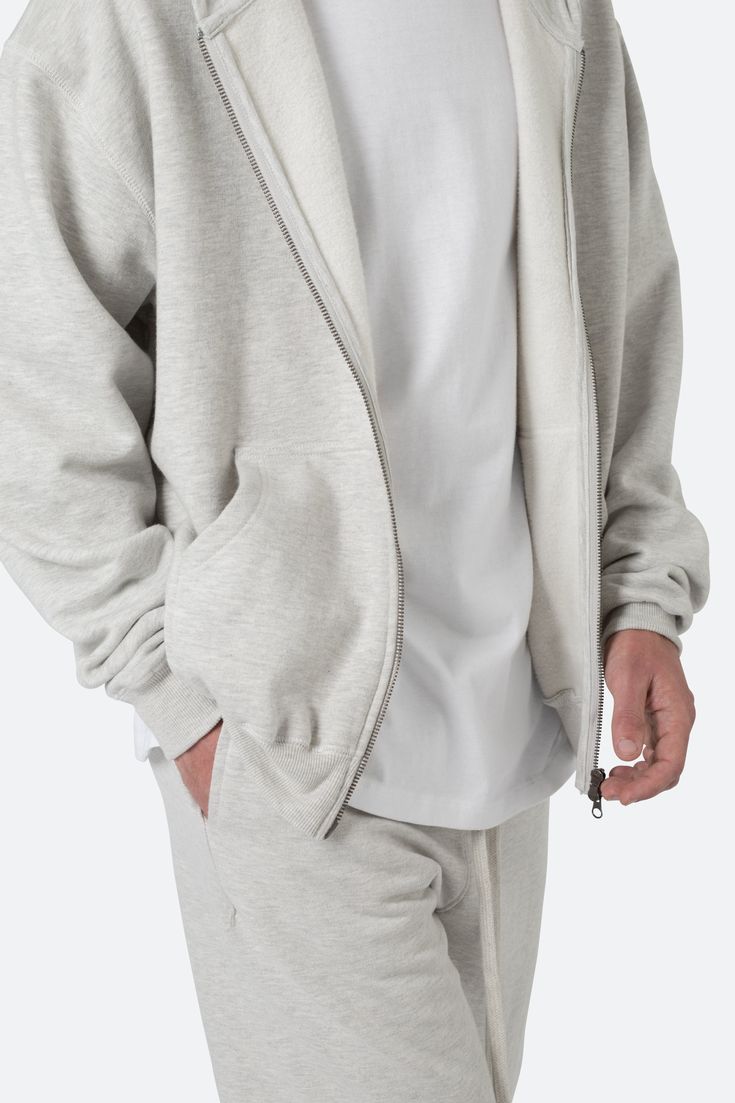 the Basic Zip Up Hoodie is designed from 100% cotton french terry, with a T8 metal zipper at the chest, a kangaroo pocket that is split onto both sides, and is finished with a garment wash. details relaxed fit 100% cotton model is 6’0, 140 lbs and wearing a size medium Layered Hoodie, 140 Lbs, Fuzzy Cardigan, Denim Patches, Denim Flares, Metal Zipper, Fit Ideas, Grey Hoodie, Zip Up Hoodie