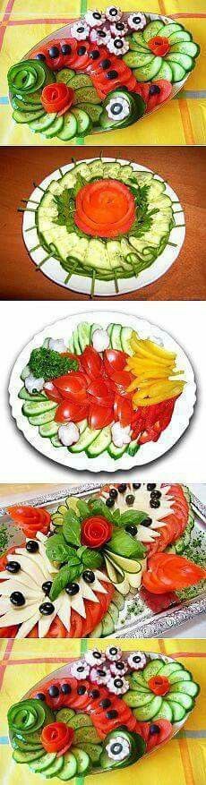 three plates with fruit and vegetables on them, one has an eyeball in the center