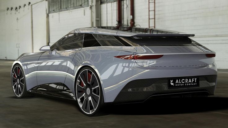 an all - electric sports car parked in a garage