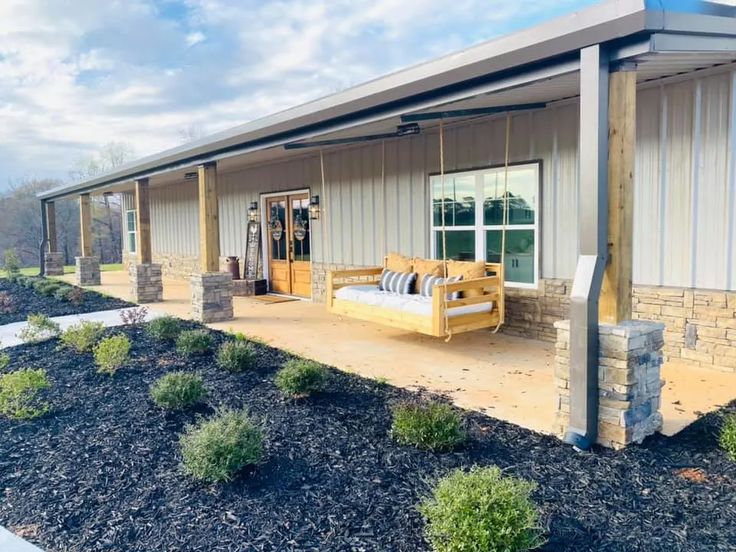 a house with a porch and covered patio