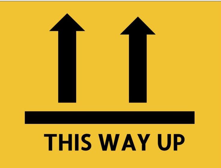 this way up sign with two arrows pointing in different directions and the words,'this way up '