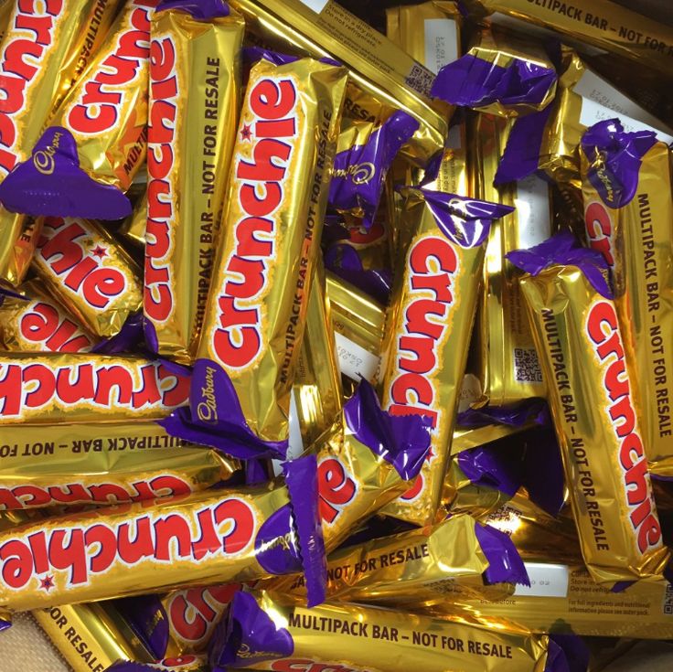 a pile of caddy's chocolate bars sitting on top of each other