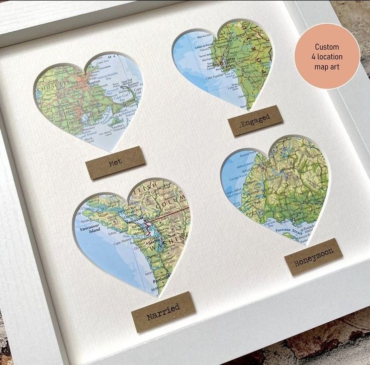 three heart shaped maps in a white frame