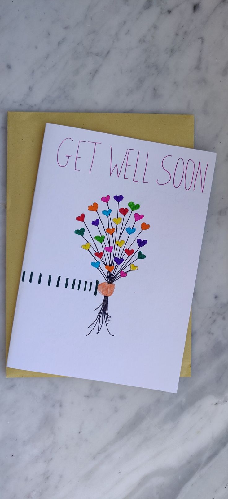 a greeting card with the words get well soon on it