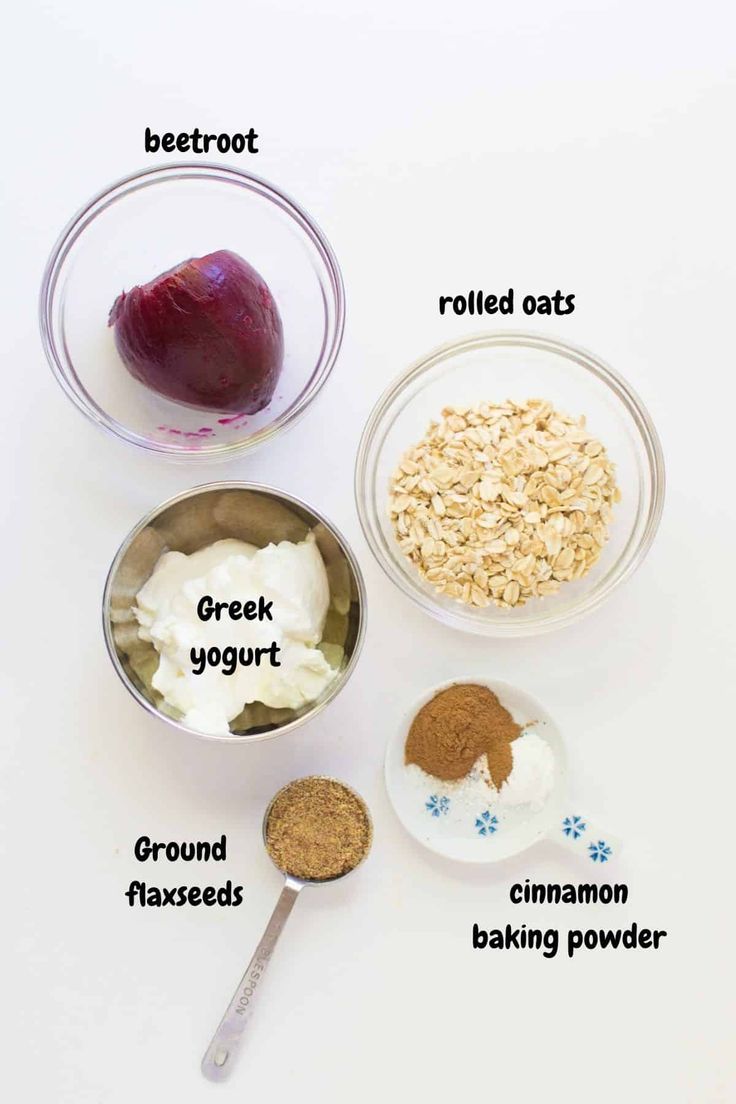 ingredients to make an oatmeal smoothie are shown in bowls on a white surface