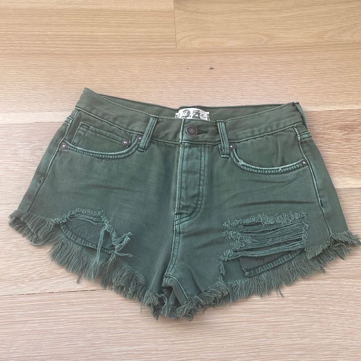 Such A Cute Army Green Pair Of Denim Shorts!! Nwot And Such A Good Staple To Have In Your Closet But In A Fun Color. Great Quality Too! Trendy Green Cutoff Shorts, Trendy Green Cutoff Jean Shorts, Green Shorts With Frayed Hem, Green Cotton Jeans With Frayed Hem, Ripped Green Cotton Bottoms, Trendy Green Distressed Bottoms, Green Bottoms With Frayed Hem In Short Length, Green Denim Jean Shorts With Pockets, Green High-waisted Denim Jean Shorts