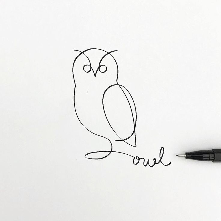 an owl is sitting on top of a piece of paper with the word owl written in cursive writing