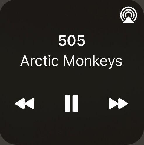 there is an arrow pointing to the right and left directions for arctic monkeys on this screen