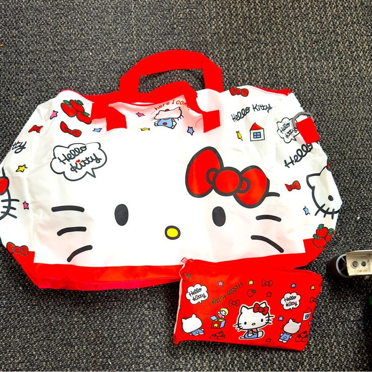 New Hello Kitty Nylon Bag Can Be Travel Bag, Tote Very Pretty Size 22.5”W X 13.5”H. Also There’s A Small Bag So You Can Put The Bag Inside White Hello Kitty Print Bag For Daily Use, White Hello Kitty Print Shopping Bag, White Hello Kitty Shopping Bag, Red Nylon Shopping Bag, White Hello Kitty Bag For Daily Use, White Travel Bag With Hello Kitty Print, White Hello Kitty Print Travel Bag, Casual White Hello Kitty Shoulder Bag, White Nylon Shopping Bag