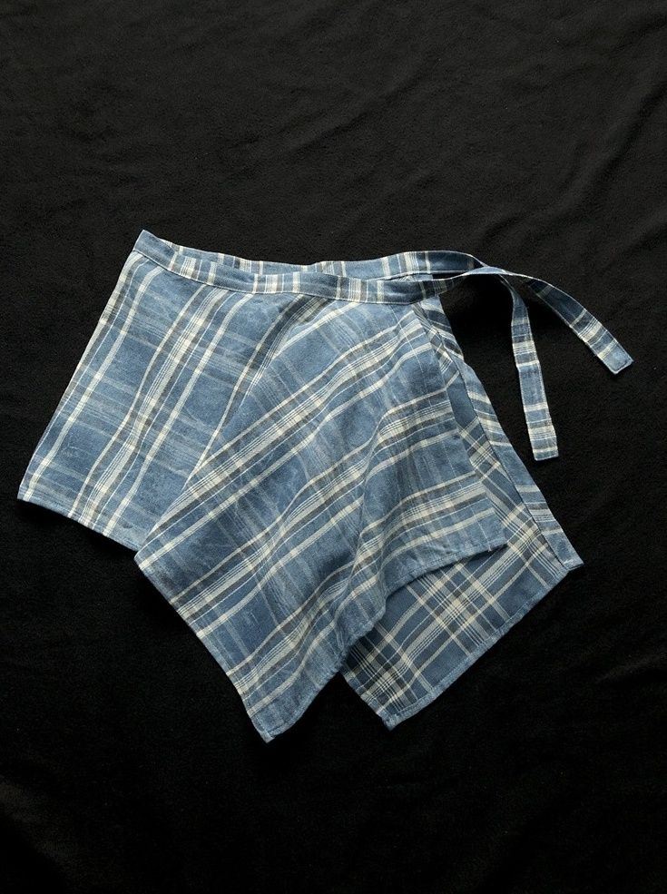 Blue Plaid Wrap Flowy Wrap Skirt | IU Blue One Size Casual Tie Waist Mini Wrap Skirt, Summer Cotton Mini Wrap Skirt, Casual Indigo Skirt For Summer, Casual Indigo Summer Skirt, Summer Cotton Skirt In Indigo, Casual Summer Wrap Skirt With Tie Waist, High Waist Light Blue Summer Skort, Short Blue Skirt For Summer, Blue Short Skirt For Summer