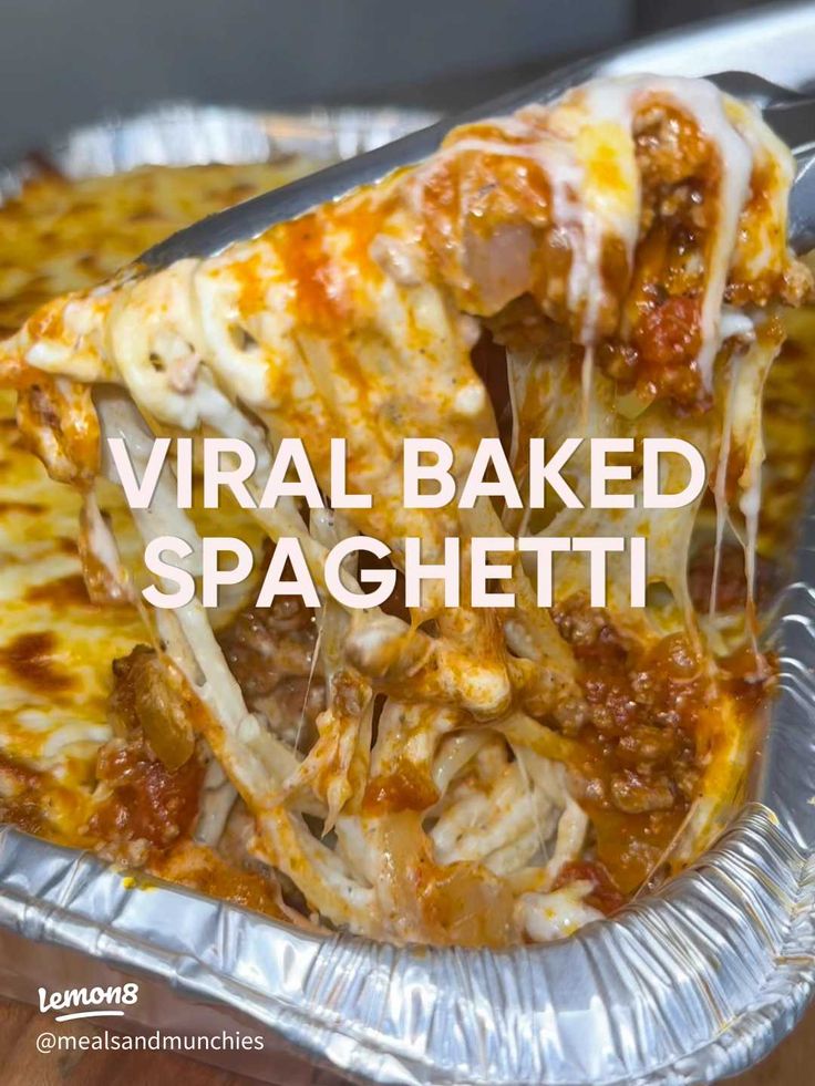 a close up of a piece of pizza on a pan with the words virtual baked spaghetti