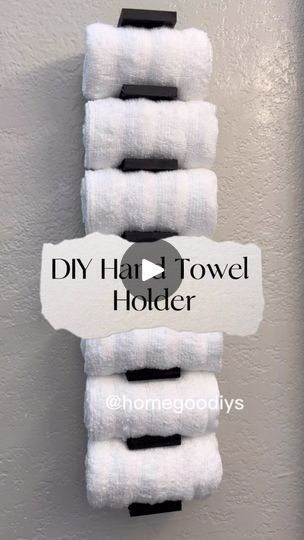 towels hanging on the wall with text that reads diy hair towel holder