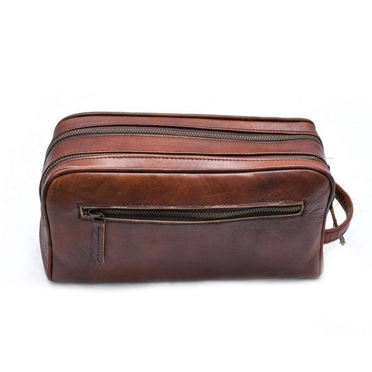 Trustpilot Keep your all grooming products organized and accessible with this stylish leather toiletry bag. Whether you’re going globetrotting or heading to gym, this essential small leather piece of kit will help you organize your things easily so you can take them with you wherever you go.Made from full-grain goat leather its simple yet sturdy design will survive spills and withstand being thrown into your luggage time after time to last you for years. Salient Features Colors: Vintage Brown Ma Leather Travel Cosmetic Bag With Zipper, Large Capacity Leather Travel Pouch, Leather Cosmetic Bag With Luggage Sleeve For Travel, Functional Leather Cosmetic Bag For Everyday Use, Leather Travel Pouch With Zipper Closure, Brown Leather Pouch With Large Capacity, Large Capacity Leather Travel Cosmetic Bag, Functional Leather Pouch Cosmetic Bag, Functional Leather Cosmetic Pouch