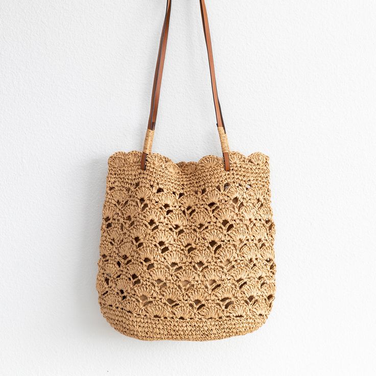 Eco-friendly Straw Bucket Bag With Woven Leather, Casual Shoulder Bag With Open Weave In Natural Fiber, Casual Natural Bag With Woven Leather Details, Casual Natural Bag With Woven Leather, Casual Shoulder Bag With Open Weave Natural Fiber, Casual Natural Fiber Shoulder Bag With Open Weave, Casual Natural Woven Leather Bag, Beige Crochet Bag With Woven Leather, Casual Natural Shoulder Bag With Open Weave