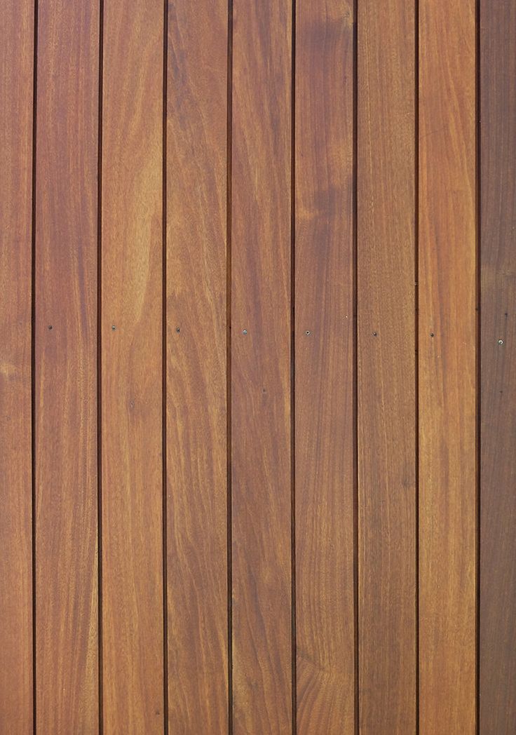 a close up of a wooden wall with no one on it