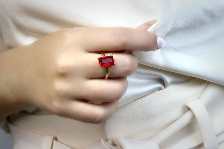 Complete your look with this Ruby jewelry ring with its delicate luster and sophistication. This handcrafted ring for women has a high polish finish to beautifully compliment the vibrant gem. Wrap this birthstone jewelry as a special day or just a treat for yourself. ☛ 𝒜𝐵𝒞 - Add Engraving - https://etsy.me/3CLxYPZ ☛ Ring size - Select the size you would like from the drop down menu ♥ Gemstone Type - Ruby (Lab Created) ♥ Gemstone Size - 7x11mm ♥ Gemstone Cut - Rectangle ♥ Metal Type (Main Phot Modern Emerald Cut Crystal Ring, Square Cut Crystal Gemstone Ring Gift, Crystal Ring With Rectangular Gemstone For Gift, Rectangular Crystal Gemstone Ring For Gift, Modern Radiant Cut Jewelry For Gifts, Rectangular Gemstone Crystal Ring Gift, Elegant Rectangular Birthstone Ring For Gift, Modern Wedding Rings With Rectangular Stone, Modern Rectangular Stone Wedding Rings