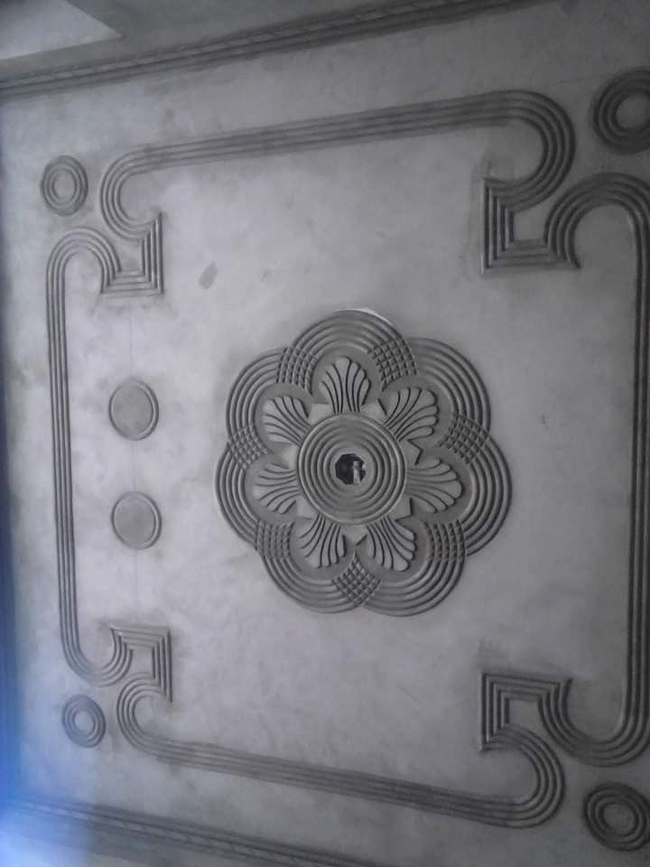 decorative ceiling tile in the shape of a flower