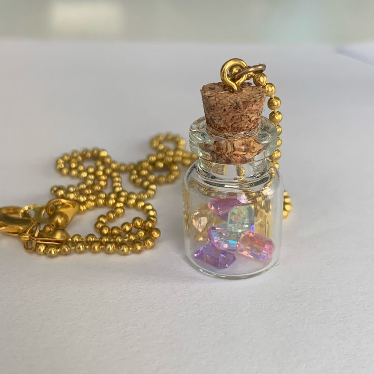 Gems In A Bottle Necklace Never Worn Flower Bottle Necklace, Gold Necklace From Urban Outfitters As A Gift, Urban Outfitters Gold Necklace As A Gift, Elegant Urban Outfitters Jewelry As Gift, Urban Outfitters Gold Jewelry For Gift, Urban Outfitters Gold Jewelry For Gifts, Glitter Bottle, Urban Outfitters Jewelry, Potion Bottles