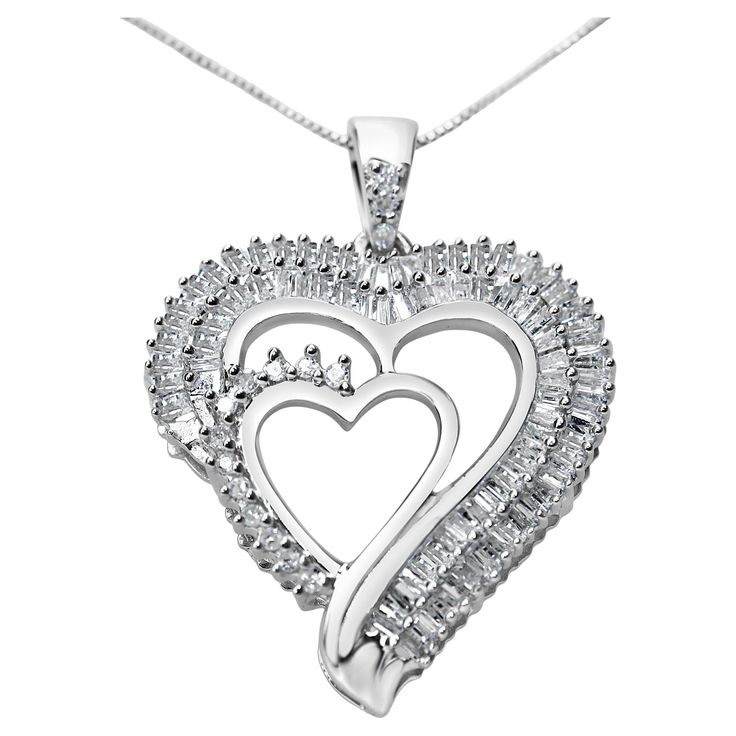 This lovely diamond pendant necklace displays a double heart motif with each of the hearts studded with shimmering diamonds for a sparkle that outshines the rest. Baguette diamonds in a channel setting adorn the outer heart and round diamonds in a prong setting frame one side of the inner heart for a unique twist, with additional diamonds studding the bail. These glamorous diamonds have a total 3/4 cttw and are of an approximate I-J color and I3 clarity. Made from fine .925 sterling silver, this Necklace Displays, Necklace Chain Types, Romantic Necklace, Channel Setting, Heart Motif, Baguette Diamonds, Double Heart, Heart Studs, Diamond Pendant Necklace