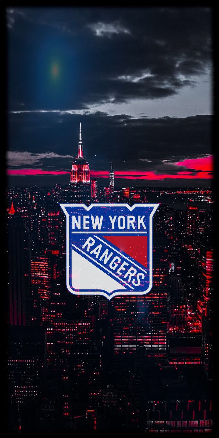 the new york rangers logo is lit up in red, white and blue above the city