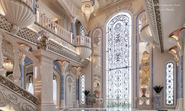 the interior of an ornately decorated building with white walls and ceilings, along with marble flooring