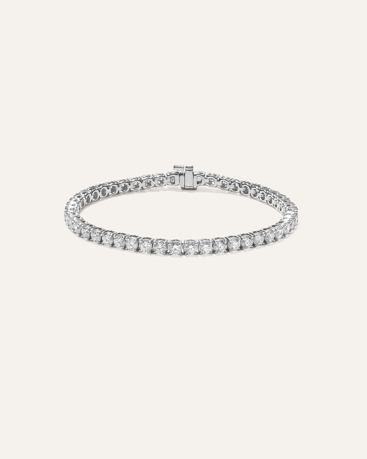 Elevate your everyday elegance with our stunning lab grown diamond tennis bracelet, featuring a classic 4-prong design that showcases each stone's brilliance. Available in two lengths and five different total carat weight options, this bracelet allows you to customize your perfect fit and desired level of sparkle. The secure box clasp with safety closure ensures your precious piece stays firmly in place, making it ideal for daily wear without worry. Place Making, Everyday Elegance, Diamond Tennis Bracelet, Box Clasp, Tennis Bracelet Diamond, Tennis Bracelet, Quince, Lab Grown, Lab Grown Diamonds