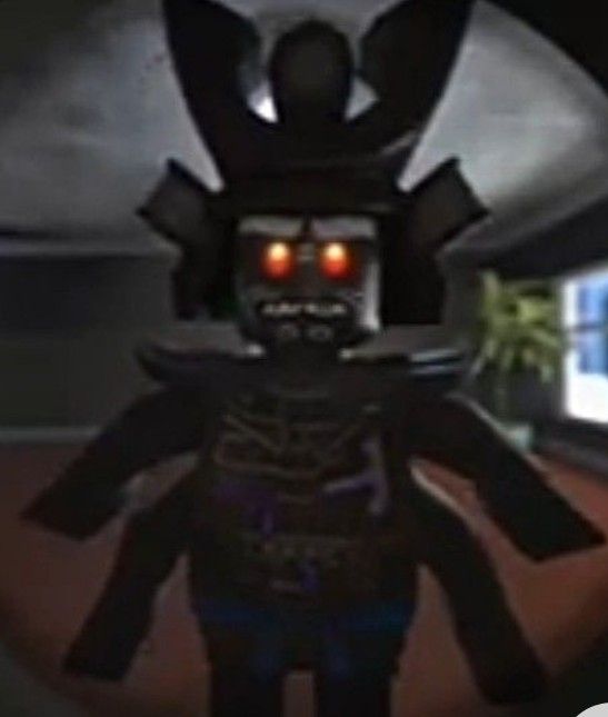 a cartoon character with red eyes and a creepy look on his face, standing in front of a computer screen