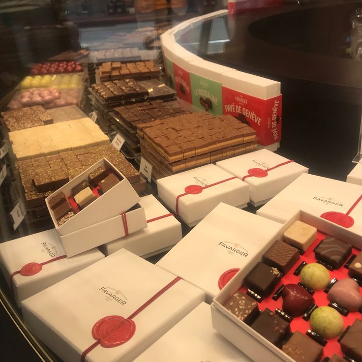 a display case filled with lots of different types of chocolates