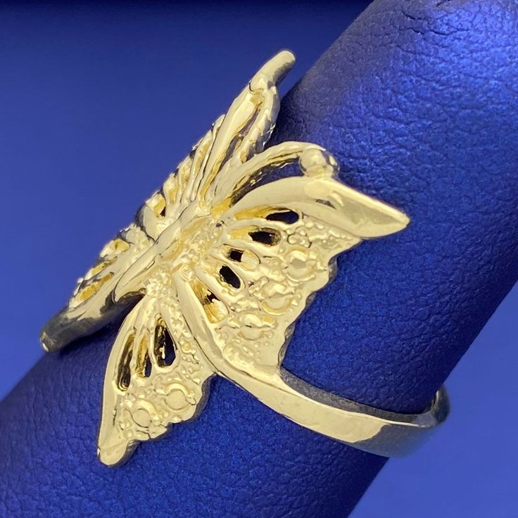 This butterfly ring is a bold statement of beauty and luxury. Crafted with solid 10k yellow gold, this elegant masterpiece will make you feel like royalty. Its intricate details make it a timeless accessory that will be cherished for a lifetime. Grab this stunning piece now and make your presence felt! Metal: 10k GoldType: RingSize: 6.5 Luxury Butterfly Ring For Wedding, Luxury Butterfly Ring For Formal Occasions, 14k Gold Butterfly Jewelry For Anniversary, 14k Gold Butterfly Jewelry For Formal Occasions, Elegant 14k Gold Butterfly Jewelry, Formal 14k Gold Butterfly Jewelry, Luxury Butterfly Ring For Anniversary, Luxury White Gold Butterfly Ring, Elegant White Gold Butterfly Open Ring