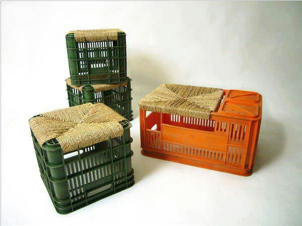 three green and orange baskets sitting next to each other on top of a white surface