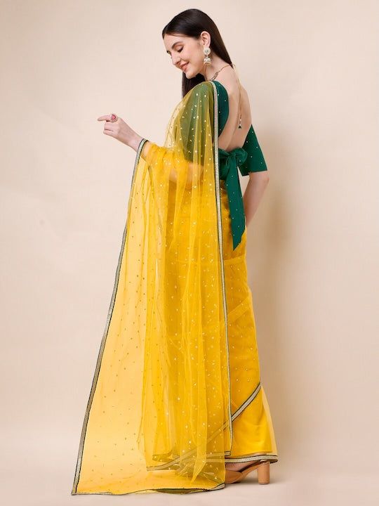 Mustard-colored & Gold-colored sareeDesign DetailsMustard & gold-toned sareeEmbroidered saree with embroidered borderHas zari detailThe saree comes with an unstitched blouse pieceThe blouse worn by the model might be for modelling purpose only. Check the image of the blouse piece to understand how the actual blouse piece looks like. Net Sarees, Western Kurtis, Saree Sale, Bandhani Saree, Net Saree, New Launch, Half Saree, Printed Sarees, The Model