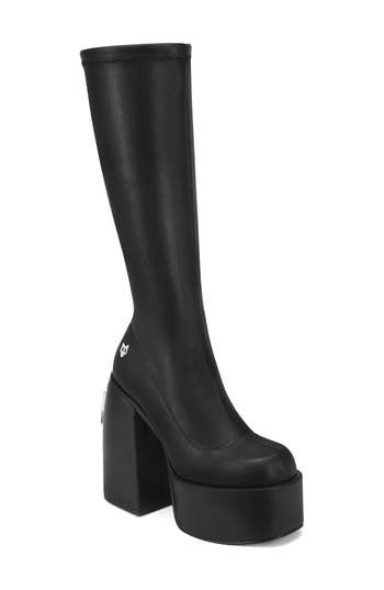 Slip into the bold '90s vibe of this sleek, stretchy tall boot with a custom platform and heel made to look both minimalist and ultramodern. Exclusive retailer 5" heel; 2" platform Synthetic upper/textile lining/synthetic sole Imported Trendy High Shaft Platform Heeled Boots, Modern Black Platform Boots For Streetwear, Modern Knee-high Platform Heeled Boots, Modern Black High Shaft Boots, Modern Fitted Platform Boots, Modern Fitted Platform Boots For Night Out, Knee-high Platform Boots With Reinforced Heel, Modern Knee-high Platform Boots With Sculpted Heel, Modern Platform Boots In Polyurethane