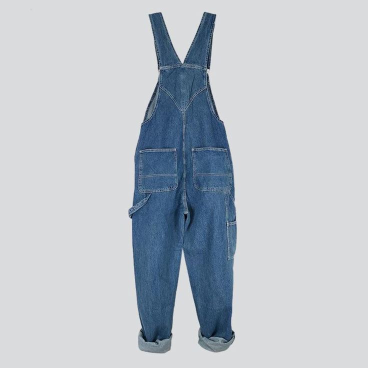 Bring back the 90s with our unrubbed men's denim dungaree from the 2023 Spring-Summer Collection ââ‚?an iconic piece that'll make you stand out in every crowd!Why You'll Love ItThis dungaree is designed to keep you stylish. comfortable. and on-style. Its medium wash and loose fit provide a timeless look and fit type that you can rock day or night. Plus. the suspenders & buttons closure. intricately painted prints. and sanded finish all come together to make this an unforgettable piece.Unmissable Medium Wash Cotton Shortalls With Straight Leg, Medium Wash Cotton Straight Leg Shortalls, Relaxed Fit Denim Jeans With Bib Front, Relaxed Fit Bib Front Denim Jeans, Denim Bib Front Overalls, Washed Blue Denim Utility Overalls, Utility Denim Overalls In Washed Blue, Denim Blue Utility Overalls For Summer, Summer Bib Front Denim Jeans