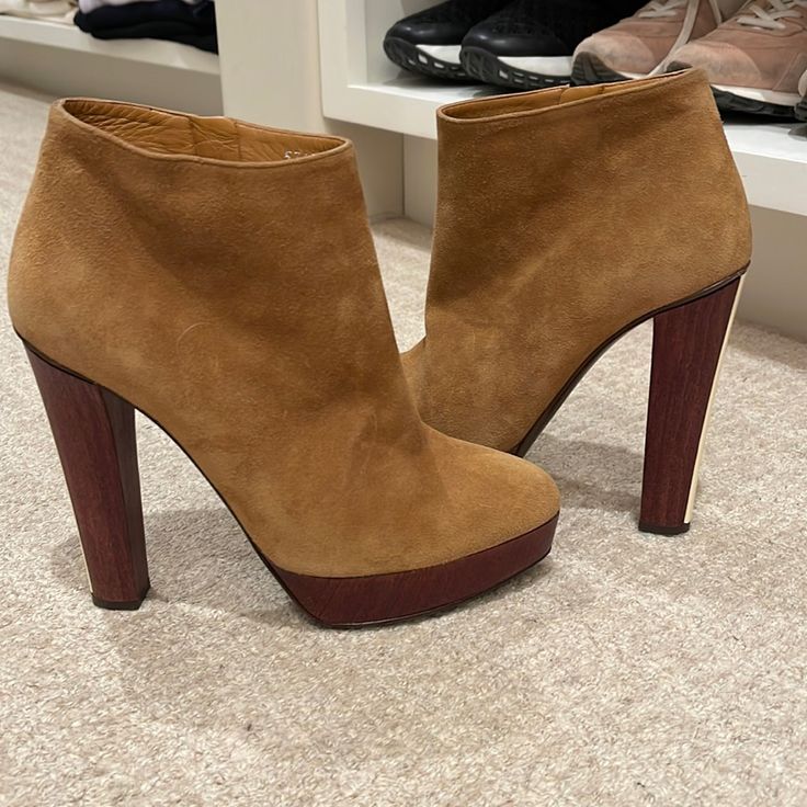 Gorgeous Camel Colored Suede Ankle Booties With Side Zippers And Rich Brown Soles. Heels Are 5.25” And Platform Is 1”. Gently Used But Like New. Just Had Skid Pads Out On Soles. No Flaws. Brown Heels With Suede Lining And Medium Width, Brown Almond Toe Heels With Suede Lining, Brown Suede Lined Round Toe Heels, Brown Block Heel With Suede Lining, Brown Heels With Suede Lining And Round Toe, Modern Brown Suede Heels, Brown Suede Ankle Boot Heels, Ralph Lauren Shoes, Camel Color