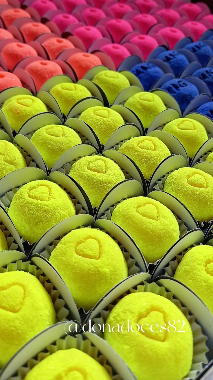 there are many tennis balls with faces on them