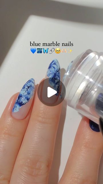 Paula 💅🏻🌙💗 on Instagram: "blue marble nails! 💙🌃🦋🔗
this jelly stamper marble was technique will never get old! it’s the perfect marble looks every time! <3
— using:
• @kiaraskynails 
dark blue nail polish “Wine Down” 🌌
pastel blue nail polish “Spring Showers” 🩵
glossy top coat 
(use my code PAULAR10 for 10% off! 💸)
#bluenails #marblenails #easynailart #nailpolish #nailinspo #naildesign #diynails #nailarttutorial #nailart #nails2inspire #kiaraskynails #kiaraskynailspr #reels" Periwinkle Blue Nails Designs, Dark Blue Nail Designs, Blue Marble Nails, Dark Blue Nail, Dark Blue Nail Polish, Nail Polish Spring, Marbled Nails, Marble Nails Tutorial, Pastel Blue Nails