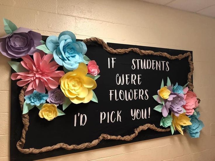 a sign with flowers on it that says if students were flowers i'd pick you