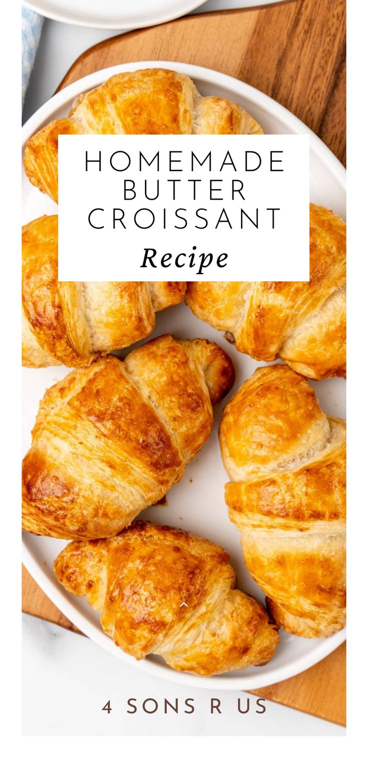 homemade buttered croissants on a white plate