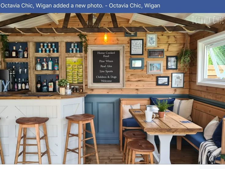 a restaurant with wooden tables and stools