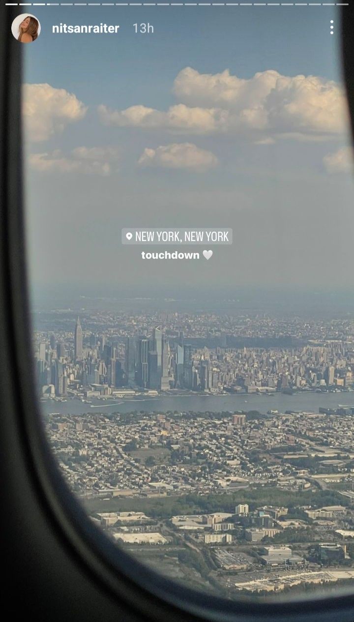 the view from an airplane window looking out on new york