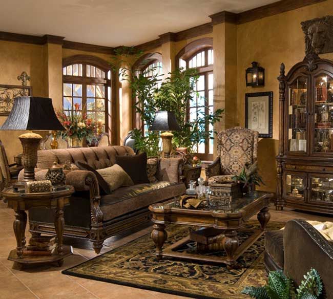 a living room filled with furniture and lots of windows