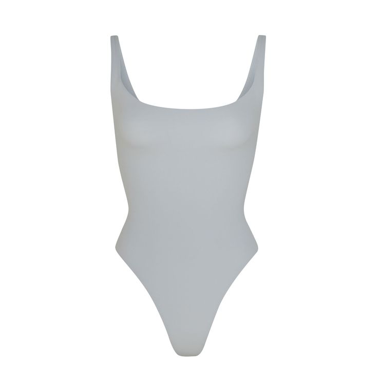 Fits Everybody Square Neck Bodysuit | Moonstone — A square neckline and low scoop back make this bodysuit a flattering base layer or everyday wardrobe item. Features a high cut leg opening and thong back that remains invisible under clothing. Sleek High Cut Summer Bodysuit, Sleek High-cut Summer Bodysuit, Sleek Summer Bodysuit With Moderate Back Coverage, Summer Scoop Neck Shapewear Bodysuit, Summer Shapewear Bodysuit With Scoop Neck, Summer High Cut Shapewear Bodysuit, Summer Elegant Bodysuit With Scoop Back, Elegant Summer Bodysuit With Scoop Back, High Cut Bodysuit With Minimal Stretch For Summer