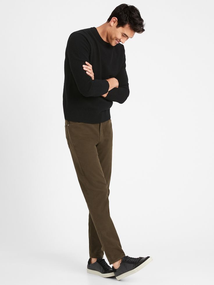 BRUSHED TRAVELER: A cozy update to our best-selling Traveler pant, this version is made Italian stretch cotton moleskin, so it has a flannel-like finish.  ATHLETIC TAPERED FIT: Not just for athletes, this fit is designed to deliver a modern, slim fit for those who like a little more room through the seat and thigh.  Zip fly with button closure.  Belt loops.  Five-pocket styling.  Tapered Fit: Mid-rise.  Extra room through the seat and thighs.  Tapered leg.  Slim leg opening measures 6. 75" flat. Skater Business Casual Men, Straight Leg Pants Outfit Winter, Male Pants Reference, Redbull Outfits, Mens Work Fashion, Mens 40s Fashion, Mens Athleisure Outfits, Mens Office Fashion, Men Business Casual