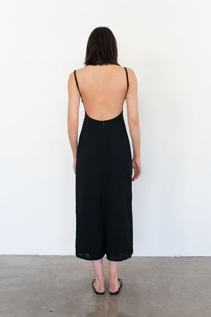 Meet the Demi dress, a 90’s inspired silhouette. Fits close to the body with a square neckline and exposed back. Black - 100% Rayon Dry Clean only. Fully lined. Cris is 5'9 / 175 cm and wearing a size 1 which is equivalent to a size Small. Backless Midi Dress With Ruched Back For Night Out, Fitted Slip Dress With Back Opening For Date Night, Ruched Low Back Dress For Night Out, Low Back Dress With Ruched Detail For Night Out, Fitted Maxi Slip Dress With Ruched Back, Fitted Maxi Length Slip Dress With Ruched Back, Fitted Slip Dress With Ruched Back, Maxi Length, Fitted Midi Slip Dress With Ruched Back, Maxi Slip Dress With Back Opening For Night Out