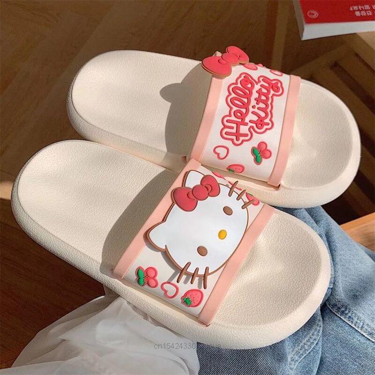 Introducing the Hello Kitty Cute Summer Sanrio Sliders ��– the perfect blend of charm, comfort, and summer style. These delightful sliders are a must-have for Hello Kitty enthusiasts who want to add a touch of cuteness to their summer wardrobe. Cute Slip-on Slippers For Summer, Cute Beach Slippers For Spring, Cute Spring Slip-on Slides, Cute Slip-on Slides For Spring, Playful Open Toe Slides For Summer, Cute Pink Summer Slippers, Cute Spring Slides, Cute Synthetic Beach Slippers, Cute Synthetic Slide Flip Flops