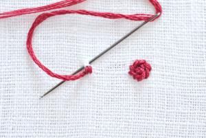 the crochet hook has been hooked up with yarn and is ready to be sewn