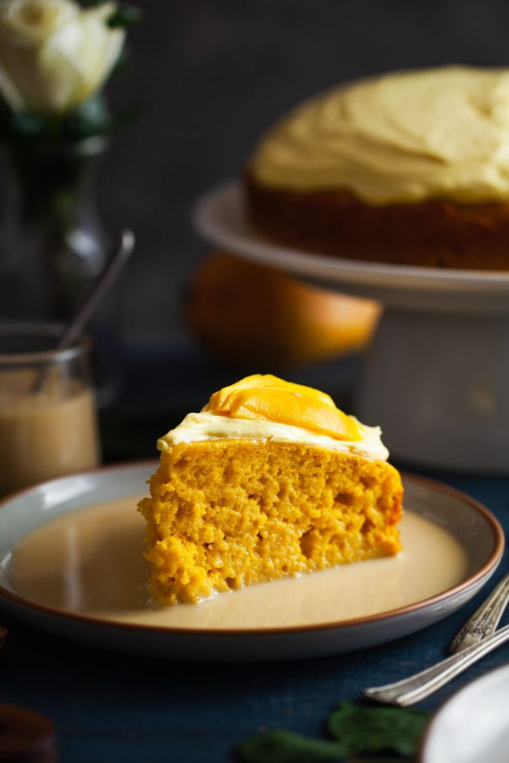 a piece of cake sitting on top of a plate next to a fork and knife