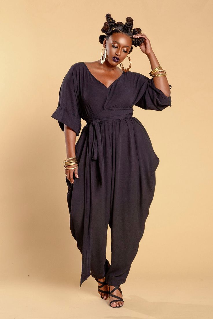 JIBRI V Neck Slouch Jumpsuit w Cuffs V Neck Gathered Waist Cuffs Permanent Cuff Tabs with mini gold button Attached Wrap Belt Relaxed fit Exaggerated hip drape Chic side pockets Invisible back zipper Fabrication: Crepe Sizing: True to Size (View Size Chart) Handmade in Atlanta, GA Style Notes: Perfect for all seasons. Works for day or evening. Add a blazer or statement necklace and control the room! Feminine Summer Outfits, Balloon Pants, Perfect Summer Outfit, Stylish Summer Outfits, Mini Gold, Wrap Belt, Plus Size Jumpsuit, Atlanta Ga, Modern Fashion