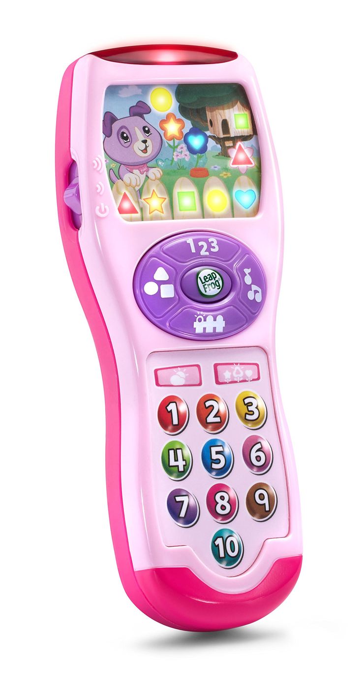 a pink toy cell phone sitting on top of a white surface